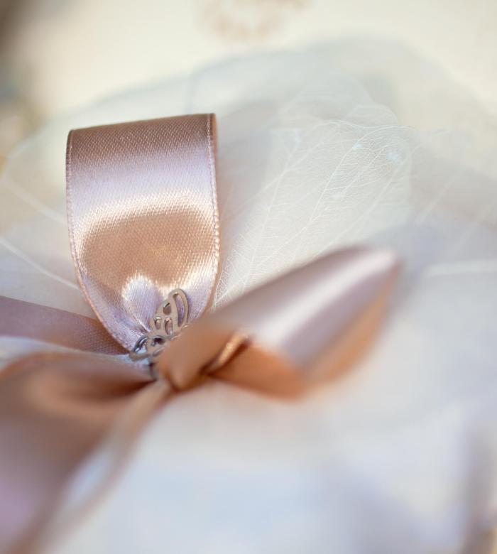pink ribbon bow as wedding decoration. small GRIP